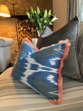 Ikat cushion with fringe trim